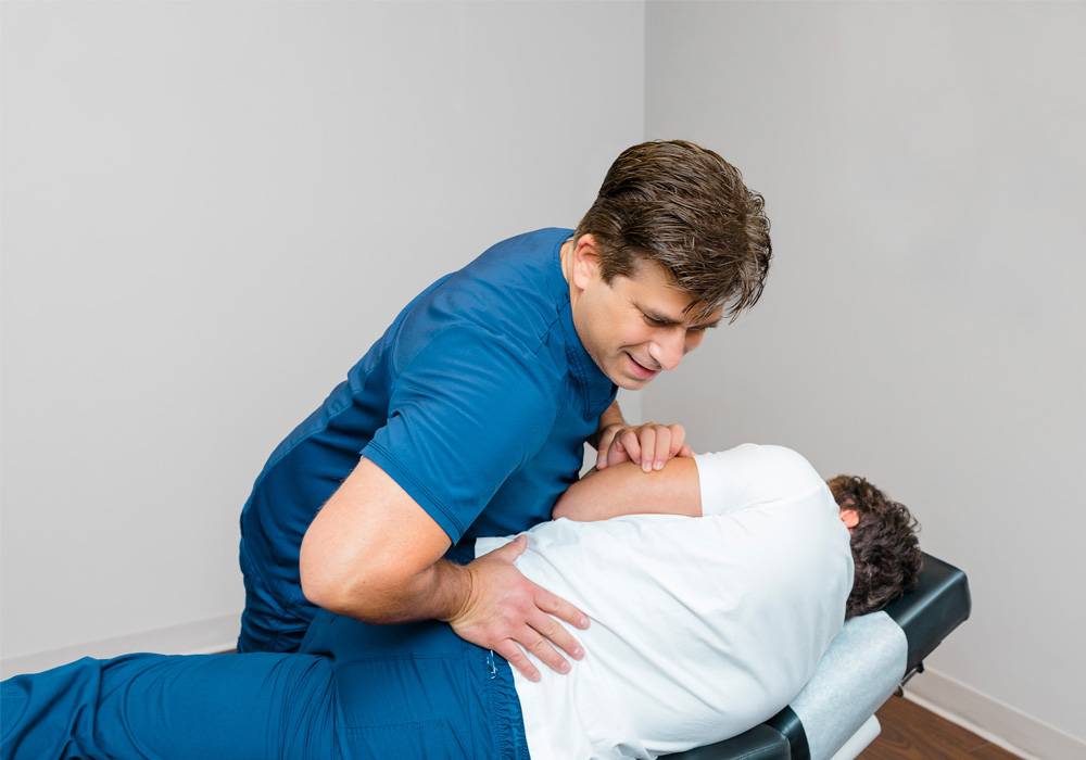 Chiropractor Thorofare NJ James Gaeta Adjusting Patient